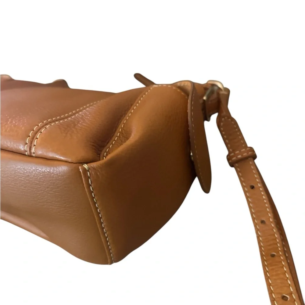 Dooney & Bourke Pebbled Grain Pocket Sac Crossbody with Side Pockets.